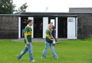 26 July 2009; Kerry supporters walk past an exit sign at a turnstile on their way to the terrace before the game. GAA All-Ireland Senior Football Championship Qualifier Round 4, Antrim v Kerry, O'Connor Park, Tullamore, Co. Offaly. Picture credit: Brendan Moran / SPORTSFILE