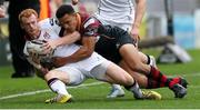 8 November 2015; Peter Nelson, Ulster, is tackled by Ashton Hewitt, Newport Gwent Dragons. Guinness PRO12, Round 7, Newport Gwent Dragons v Ulster. Rodney Parade, Newport, Wales. Picture credit: Huw Evans / SPORTSFILE