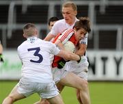 1 August 2009; Andrew Murnin, Armagh, in action against Thomas Barron, 3, and Tomas Moolick, Kildare. ESB GAA Football All-Ireland Minor Championship Quarter-Final, Armagh v Kildare, Kingspan Breffni Park, Cavan. Picture credit: Oliver McVeigh / SPORTSFILE