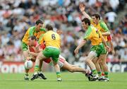 2 August 2009; Pearse O'Neill, Cork, in action against Donegal players, from left, Rory Kavanagh, Barry Monaghan, David Walsh and Kevin Cassidy. GAA Football All-Ireland Senior Championship Quarter-Final, Cork v Donegal, Croke Park, Dublin. Picture credit: Stephen McCarthy / SPORTSFILE