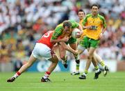 2 August 2009; Barry Monaghan, Donegal, is tackled by Daniel Goulding, Cork. GAA Football All-Ireland Senior Championship Quarter-Final, Cork v Donegal, Croke Park, Dublin. Picture credit: Stephen McCarthy / SPORTSFILE