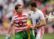 2 August 2009; Cork goalkeeper Alan Quirke, right, consoles his Donegal counterpart Michael Boyle after the game. GAA Football All-Ireland Senior Championship Quarter-Final, Cork v Donegal, Croke Park, Dublin. Picture credit: Ray McManus / SPORTSFILE