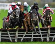 15 November 2015; Eventual winner Colla Pier, right, with Jack Kennedy up, jumps the last on their way to winning the Irish Daily Mirror Handicap Hurdle with, from left, fourth place Good As Gold, with Kate Walsh, second place Wes Hardin, with Ger Fox up, and third place Bentelimar, with Luke Dempsey up. Punchestown Racecourse, Punchestown, Co. Kildare. Picture credit: Matt Browne / SPORTSFILE