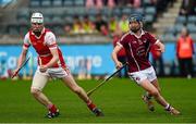 15 November 2015; Colm Cronin slips past Clara's Jason Byrne on this way to the first Cuala goal. AIB Leinster GAA Senior Club Hurling Championship, Semi-Final, Cuala v Clara. Parnell Park, Dublin. Picture credit: Ray McManus / SPORTSFILE