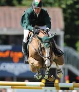 5 August 2009; Baloufina, with Cian O'Connor up, jumps the fifth during the International Speed Stakes. Fáilte Ireland Dublin Horse Show 2009, RDS, Ballsbridge, Dublin. Picture credit: Matt Browne / SPORTSFILE