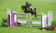 7 August 2009; Billy Twomey, Ireland, on J'Taime Flamenco, jump the 4th fence during the Meydan FEI Nations Cup. Fáilte Ireland Dublin Horse Show 2009, RDS, Ballsbridge, Dublin. Picture credit: Matt Browne / SPORTSFILE