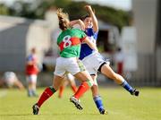 8 August 2009; Aileen O'Loughlin, Laois, is tackled by Claire Egan, Mayo. TG4 All-Ireland Ladies Football Senior Championship Qualifier Round 2, Mayo v Laois, Pearse Park, Longford. Picture credit: Brendan Moran / SPORTSFILE