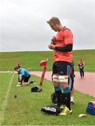 17 November 2015; Munster's Mark Chisholm puts on some strapping before squad training. University of Limerick, Limerick. Picture credit: Diarmuid Greene / SPORTSFILE