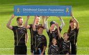 18 Novemeber 2015; Dublin footballer Jack McCaffrey and Kilkenny hurler TJ Reid pictured with Gillian Whittall, back row, right, Marketing and PR manager Opel Ireland, and children, from left, Jack Byrne, aged 11, from Strokestown, Roscommon, Kyle Casey, aged 12, from Roscommon, Ella O'Keeffe, aged, 8, from Burtis, Dublin and James Black, aged 8, from Enfield Co Meath, at the launch of the 2015 Opel GAA/GPA All-Stars jersey in support of the Childhood Cancer Foundation. The jersey will carry the CCF (Childhood Cancer Foundation) ribbon logo on the sleeve, while a percentage of all jersey sales will be donated to the Foundation by Opel and jersey manufacturers O’Neills. Croke Park, Dublin. Picture credit: Piaras Ó Mídheach / SPORTSFILE