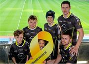 18 Novemeber 2015; Dublin footballer Jack McCaffrey, front right, and Kilkenny hurler TJ Reid, back right, pictured with, from left,  James Black, aged 8, from Enfield, Co Meath, Jack Byrne, aged 11, from Strokestown, Roscommon, Kyle Casey, aged 12, from Roscommon, and Ella O'Keeffe, aged, 8, from Burtis, Dublin, and at the launch of the 2015 Opel GAA/GPA All-Stars jersey in support of the Childhood Cancer Foundation. The jersey will carry the CCF (Childhood Cancer Foundation) ribbon logo on the sleeve, while a percentage of all jersey sales will be donated to the Foundation by Opel and jersey manufacturers O’Neills. Croke Park, Dublin. Picture credit: Piaras Ó Mídheach / SPORTSFILE