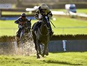 18 November2015; Up For Review, with Ruby Walsh up, on their way to winning the Fairyhouse Membership 2016 Now Available Maiden Hurdle after jumping the last. Fairyhouse Racecourse, Fairyhouse, Co. Meath. Picture credit: Matt Browne / SPORTSFILE