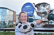 18 November2015; Lorna Brooke celebrates with the trophy after winning the Today FM Ladies Handicap Steeplechase on Moonlone Lane. Fairyhouse Racecourse, Fairyhouse, Co. Meath. Picture credit: Matt Browne / SPORTSFILE