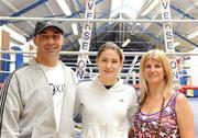 14 August 2009; European boxing champion Katie Taylor with her parents Pete and Bridget during a press conference after yesterday's announcement by the International Olympic Committee (IOC) that women's boxing will be included in the 2012 Olympics. National boxing Stadium, Dublin Picture credit: Dáire Brennan / SPORTSFILE