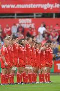 14 August 2009; Munster players stand together during a minute's silence in memory of Stuart Mangan who was laid to rest today after being paralysed while playing a rugby match 16 months ago. Pre-Season Friendly, Munster v Sale Sharks, Musgrave Park, Cork. Picture credit; Diarmuid Greene / SPORTSFILE