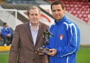 16 August 2009; Declan O'Brien, St.Patrick's Athletic, who received the Soccer Writers Association of Ireland Player of the Month award for July from Paul Buttner, Soccer Writers Association of Ireland. Richmond Park, Dublin. Picture credit: David Maher / SPORTSFILE