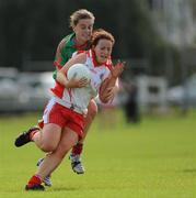 15 August 2009; Carol Dooher, Tyrone, in action against Kathryn Sullivan, Mayo. TG4 All-Ireland Ladies Football Senior Championship Quarter-Final, Tyrone v Mayo, Ballymahon GAA Club, Ballymahon, Co. Longford. Photo by Sportsfile