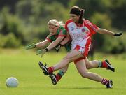 15 August 2009; Maura Kelly, Tyrone, in action against Cora Staunton, Mayo. TG4 All-Ireland Ladies Football Senior Championship Quarter-Final, Tyrone v Mayo, Ballymahon GAA Club, Ballymahon, Co. Longford. Photo by Sportsfile