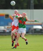 15 August 2009; Lynda Donnelly, Tyrone, in action against Natasha Beegan, Mayo. TG4 All-Ireland Ladies Football Senior Championship Quarter-Final, Tyrone v Mayo, Ballymahon GAA Club, Ballymahon, Co. Longford. Photo by Sportsfile