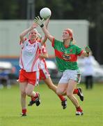 15 August 2009; Lynda Donnelly, Tyrone, in action against Natasha Beegan, Mayo. TG4 All-Ireland Ladies Football Senior Championship Quarter-Final, Tyrone v Mayo, Ballymahon GAA Club, Ballymahon, Co. Longford. Photo by Sportsfile