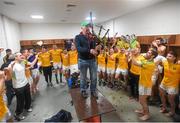 22 November 2015; Dermot Walsh, from Valentia Island, plays the bag pipes as the South Kerry players celebrate their victory. Kerry County Senior Football Championship Final Replay, South Kerry v Killarney Legion. Fitzgerald Stadium, Killarney, Co. Kerry. Picture credit: Stephen McCarthy / SPORTSFILE