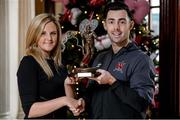 25 November 2015; Richie Towell, Dundalk, is presented with his SSE Airtricity/SWAI Player of the Month Award for November 2015 by Leanne Sheill from SSE Airtricity. Davenport Hotel, Merrion Square, Dublin. Picture credit: Sam Barnes / SPORTSFILE