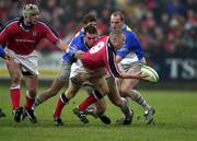 20 January 2001; Peter Stringer of Munster is tackled by theirry Labrousse of Castres during the Heineken Cup Pool 4 Round 6 match between Munster and Castres at Musgrave Park in Cork. Photo by Brendan Moran/Sportsfile
