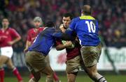 20 January 2001; Jason Holland of Munster is tackled by Damien Denechanny, left, and Gregor Townsend of Castres during the Heineken Cup Pool 4 Round 6 match between Munster and Castres at Musgrave Park in Cork. Photo by Brendan Moran/Sportsfile
