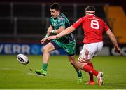 28 November 2015; Tiernan O'Halloran, Connacht, kicks the ball past Robin Copeland, Munster. Guinness PRO12, Round 8, Munster v Connacht. Thomond Park, Limerick. Picture credit: Seb Daly / SPORTSFILE