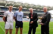 2 September 2009; Uachtarán Chumann Lúthchleas Gael Criostóir Ó Cuana shows off his handball skills alongside, from left; Robbie McCarthy, Westmeath, Eoin Kennedy, Dublin, and President of the Handball Association Tony Hannon during the launch of the GAA Handball All-Ireland Senior and Minor Singles Finals. The launch takes place ahead of Saturday’s GAA Handball All-Ireland 60x30 Senior Singles Final, sponsored by M Donnelly, where Dublin’s Eoin Kennedy takes on Westmeath's Robbie McCarthy. Kennedy is bidding for a sixth consecutive title, while McCarthy is appearing in his first Senior Final. Croke Park, Dublin. Picture credit: Pat Murphy / SPORTSFILE