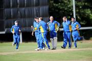 4 September 2009; Andrew McBrine, third from left, Donemana, celebrates with team-mates after bowling and catching Leinster's Mark Jones out for 44 runs. Bob Kerr Irish Senior Cup Final 2009, Leinster v Donemana, The Hills Cricket Club, Milverton, Skerries, Dublin. Picture credit: Brian Lawless / SPORTSFILE