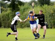 5 September 2009; John Neylon, Diarmuid O Mathuna, in action against Padraig Raferty, left, and Paul O'Brien, Padraig Pearses. The Bord Gáis Energy St. Jude’s All-Ireland Junior Hurling 7’s celebrated its 20th anniversary this year and sees the addition of a new title sponsor in Bord Gáis Energy. 20 club teams, drawn from the four Provinces, battled it out for the hurling title while the football competition will be played out on Saturday, 19 September, and will see 24 teams from Ireland and Great Britain compete. Bord Gáis Energy St. Jude’s All-Ireland Junior Hurling 7’s 2009, St. Jude’s GAA Club, Templeogue, Dublin. Picture credit: Stephen McCarthy / SPORTSFILE