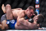 11 December 2015; Artem Lobov, left, in action against Ryan Hall during their lightweight bout. The Ultimate Fighter Finale: Team McGregor vs. Team Faber, The Chelsea at The Cosmopolitan, Las Vegas, USA. Picture credit: Ramsey Cardy / SPORTSFILE