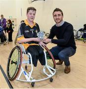 12 December 2015; Kilkenny hurler David Herity presents Conn Nagle, Ulster/Antrim, with the player of the tournament, during the M. Donnelly GAA Wheelchair Hurling Interprovincial All-Star Awards & All-Ireland Finals. I.T. Blanchardstown, Blanchardstown, Dublin 15. Picture credit: Oliver McVeigh / SPORTSFILE
