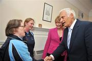 8 September 2009; President of the EU Parliament Jerzy Buzek MEP is introduced to Special Olympic athletes Fiona Byrne, from Marino, and Ciara MacNeill, Table Tennis, from Walkinstown, left, by Mary Davis, Managing Director of Special Olympics Europe/Eurasia, during a visit to Special Olympics Europe/Eurasia Headquarters. 32 Morrison Chambers, Nassau Street, Dublin. Picture credit: Brian Lawless / SPORTSFILE