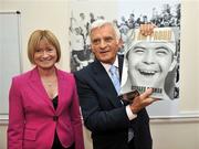 8 September 2009; President of the EU Parliament Jerzy Buzek MEP is presented with a book on Special Olympic Athletes by Mary Davis, Managing Director of Special Olympics Europe/Eurasia, during a visit to Special Olympics Europe/Eurasia Headquarters. 32 Morrison Chambers, Nassau Street, Dublin. Picture credit: Brian Lawless / SPORTSFILE