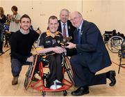 12 December 2015; Conor McGrotty, Ulster/Derry, receives the winners trophy from David Herity, left, Kilkenny Hurler, Martin McAviney, Ulster GAA President, and John Horan, right, Leinster GAA President, during the M. Donnelly GAA Wheelchair Hurling Interprovincial All-Star Awards & All-Ireland Finals. I.T. Blanchardstown, Blanchardstown, Dublin 15. Picture credit: Oliver McVeigh / SPORTSFILE