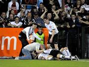 12 September 2009; Tiarnan Mulvenna, Dundalk, is surrounded by team mates and supporters, after scoring a late winner. League of Ireland Premier Division, Dundalk v Cork City, Oriel Park, Dundalk. Picture credit: Oliver McVeigh / SPORTSFILE