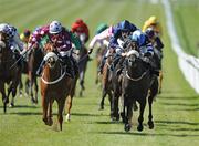 13 September 2009; Diva Dolce, right, with Darren Egan up, on their way to winning the Go Racing at the Curragh Nursery Handicap from second place Della'alba, left, with Gary Carroll up. The Curragh Racecourse, Co. Kildare. Picture credit: Matt Browne / SPORTSFILE