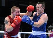 21 June 2015; Raitis Sinkevics, Latvia, left, exchanges punches with Darren O'Neill, Ireland, during their Men's Boxing Heavy 91kg Round of 16 bout. 2015 European Games, Crystal Hall, Baku, Azerbaijan. Picture credit: Stephen McCarthy / SPORTSFILE