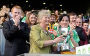 13 September 2009; President of the Camogie Association Joan O'Flynn presents the New Ireland trophy to Offaly captain Marion Crean in the presence of Gary Desmond, CEO of Gala, Sinead O'Connor, Ard Stuirthoir, and An Taoiseach Brian Cowen T.D. after the Gala All-Ireland Camogie Championship Finals. Croke Park, Dublin. Picture credit: Pat Murphy / SPORTSFILE
