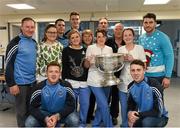 25 December 2015; Dublin footballers Paul Flynn, Bernard Brogan, Brian Fenton, Eoin Culligan, Cormac Costello, captain Stephen Cluxton and manager Jim Gavin with staff members Gabby Sullivan, Eva Christy, Ciara McBrien, Lavia Motherway and Martin Gill when they and the Sam Maguire visited patients St Damien's Ward in Beaumount Hospital on Christmas day. Beaumont Hospital, Beaumont Rd, Dublin.  Picture credit: Ray McManus / SPORTSFILE