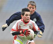 16 December 2008; Lucas Seoighe, Scoil Chrónáin, in action against Kyle Sheridan, St. Bernadette's. St. Bernadette's, Quarryvale v Scoil Chrónáin, Rathcoole, Corn an Chéid Final, Allianz Cumann na mBunscoil football finals, Croke Park, Dublin. Picture credit: David Maher / SPORTSFILE