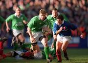 17 February 2001; Brian O'Driscoll of Ireland races clear of Xavier Garbajosa of France during the Lloyds TSB Six Nations Rugby Championship match between Ireland and France at Lansdowne Road in Dublin. Photo by Matt Browne/Sportsfile