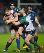 1 January 2016; Eoin Reddan, Leinster, is tackled by John Muldoon and Kieran Marmion, right, Connacht. Guinness PRO12 Round 11, Leinster v Connacht. RDS Arena, Ballsbridge, Dublin. Picture credit: Seb Daly / SPORTSFILE