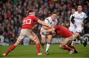2 January 2016; Paddy Jackson, Ulster, is tackled by Robin Copeland and Dave Kilcoyne, Munster. Guinness PRO12, Round 11, Ulster v Munster. Kingspan Stadium, Ravenhill Park, Belfast. Picture credit: Oliver McVeigh / SPORTSFILE
