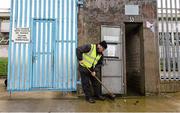 3 January 2016; Pat Leahy cleaning water from the entrance of the stadium. Bank of Ireland Dr. McKenna Cup, Group C, Monaghan v Ulster University, St Tiernach's Park, Clones, Co. Monaghan. Picture credit: Philip Fitzpatrick / SPORTSFILE