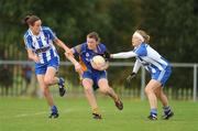 26 September 2009; Emer O'Loughlin, Sardfields Mountmellick, Co. Laois, in action against Caroline Conway, left, and Gemma Fay, Ballyboden St Enda's, Co. Dublin. 2009 All-Ireland Ladies Football 7's, Naomh Mearnog, Portmarnock, Dublin. Picture credit: Brendan Moran / SPORTSFILE