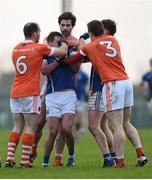 3 January 2016; Armagh players, from left, Ciarán McKeever, Aaron Findon and Charlie Vernon, Armagh, tussle with Niall Murray, Cavan. Bank of Ireland Dr. McKenna Cup, Group C, Round 1, Armagh v Cavan. St Oliver Plunkett Park, Crossmaglen, Co. Armagh. Picture credit: Stephen McCarthy / SPORTSFILE