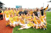 27 September 2009; The Antrim team celebrate with the West County Hotel trophy after the game. TG4 All-Ireland Ladies Football Junior Championship Final, Antrim v Limerick, Croke Park, Dublin. Picture credit: Brendan Moran / SPORTSFILE