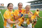 27 September 2009; Antrim players, from left, Aine McElroy, Mary McCann and Roisin Keenan celebrate with the West County Hotel cup after the game. TG4 All-Ireland Ladies Football Junior Championship Final, Antrim v Limerick, Croke Park, Dublin. Picture credit: Brendan Moran / SPORTSFILE